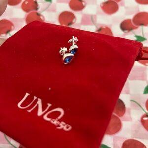 UNO de 50 Silver Devil Eye Earrings with Deep Blue Accents